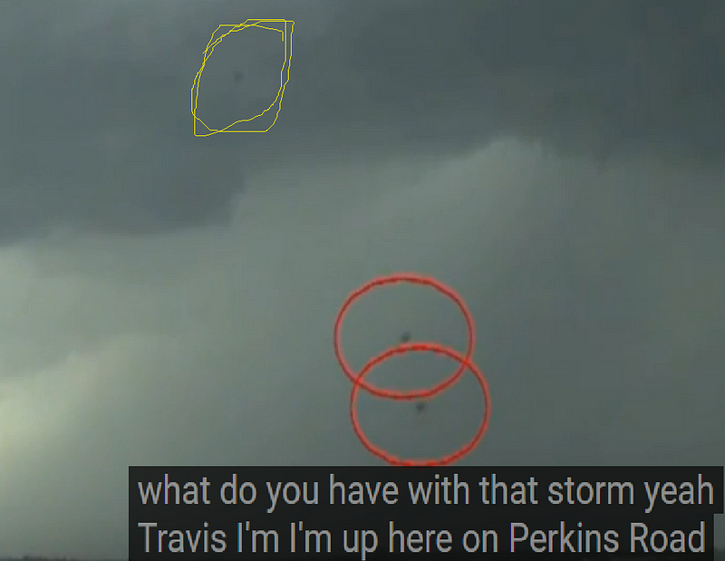 Video still showing UFOs